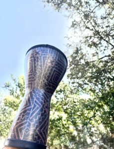 A drum with the sky in the background